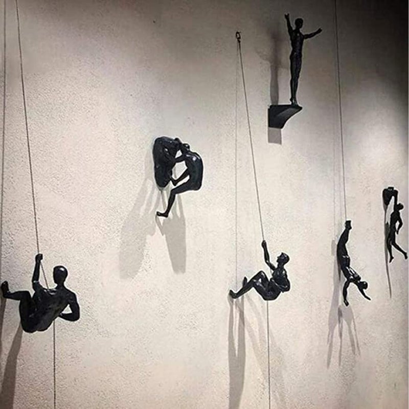 Statues de murs d'escalade