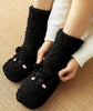 Chaussettes de nuit en velours à l'effigie de l'ours