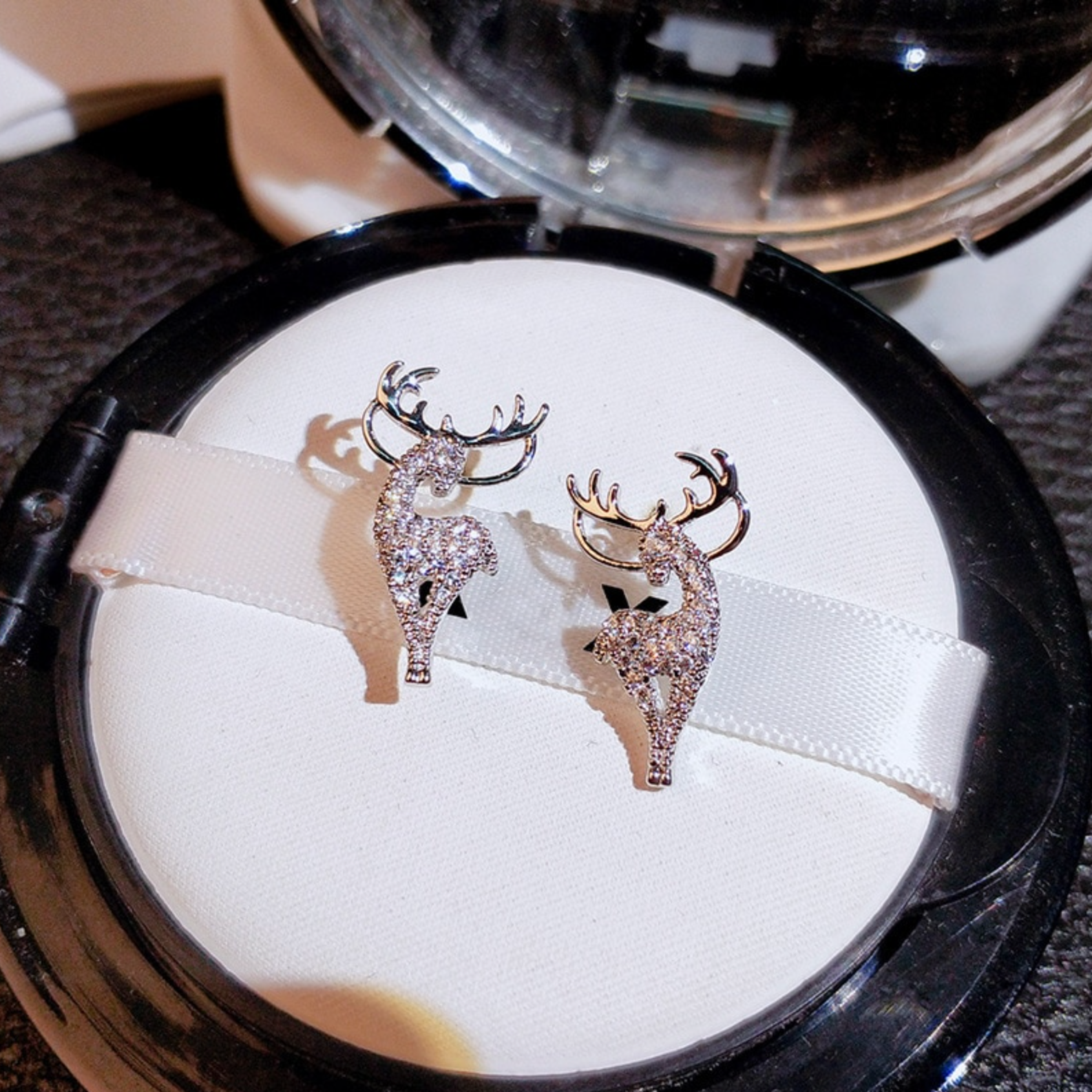 Boucles d'oreilles renne en cristal argenté