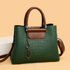 Sac à main pour dames en cuir pressé