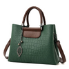 Sac à main pour dames en cuir pressé