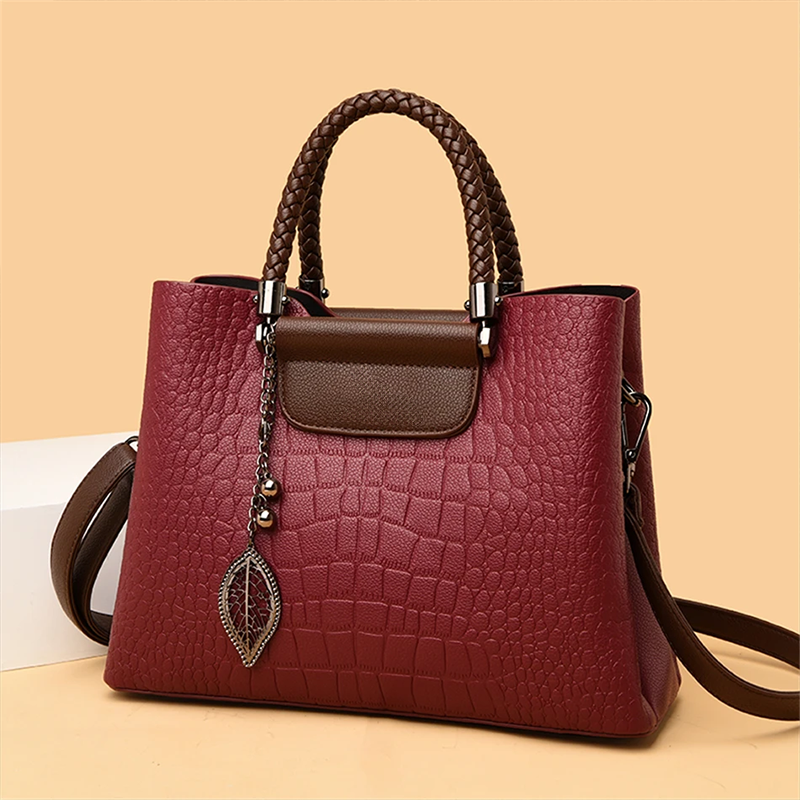 Sac à main pour dames en cuir pressé