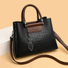 Sac à main pour dames en cuir pressé